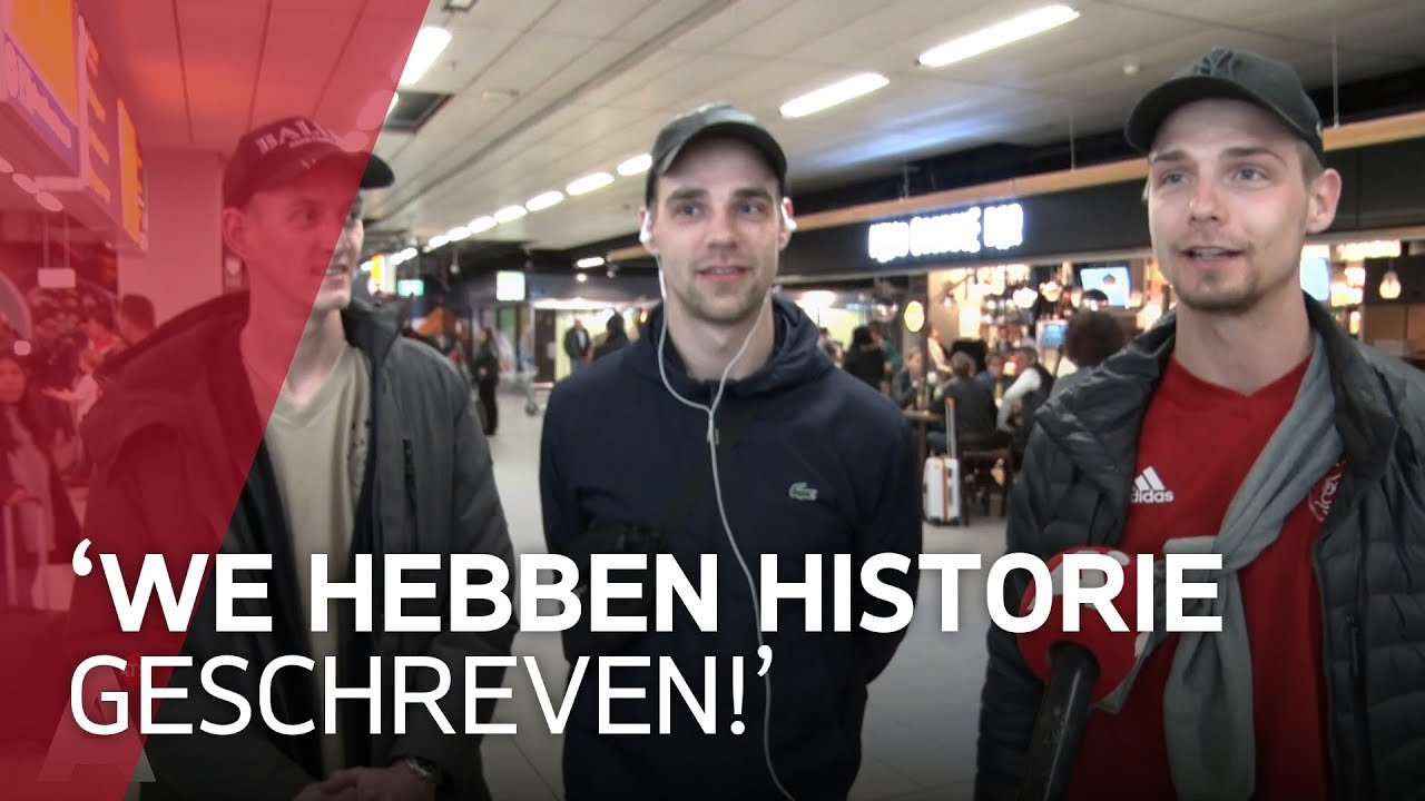Supporters komen aan op Schiphol