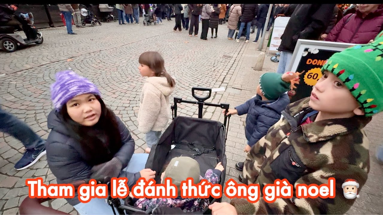 Sáng cả nhà đi chơi bên Đức, chiều về Đan Mạch tham gia lễ bật đèn cây thông, đánh thức Ông già Noel