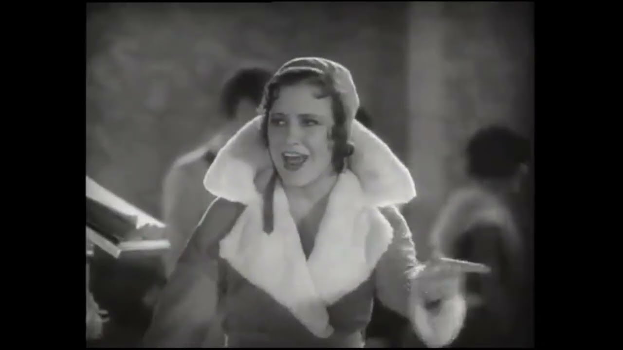 Kathryn Crawford and chorus perform I'll Make A Happy Landing