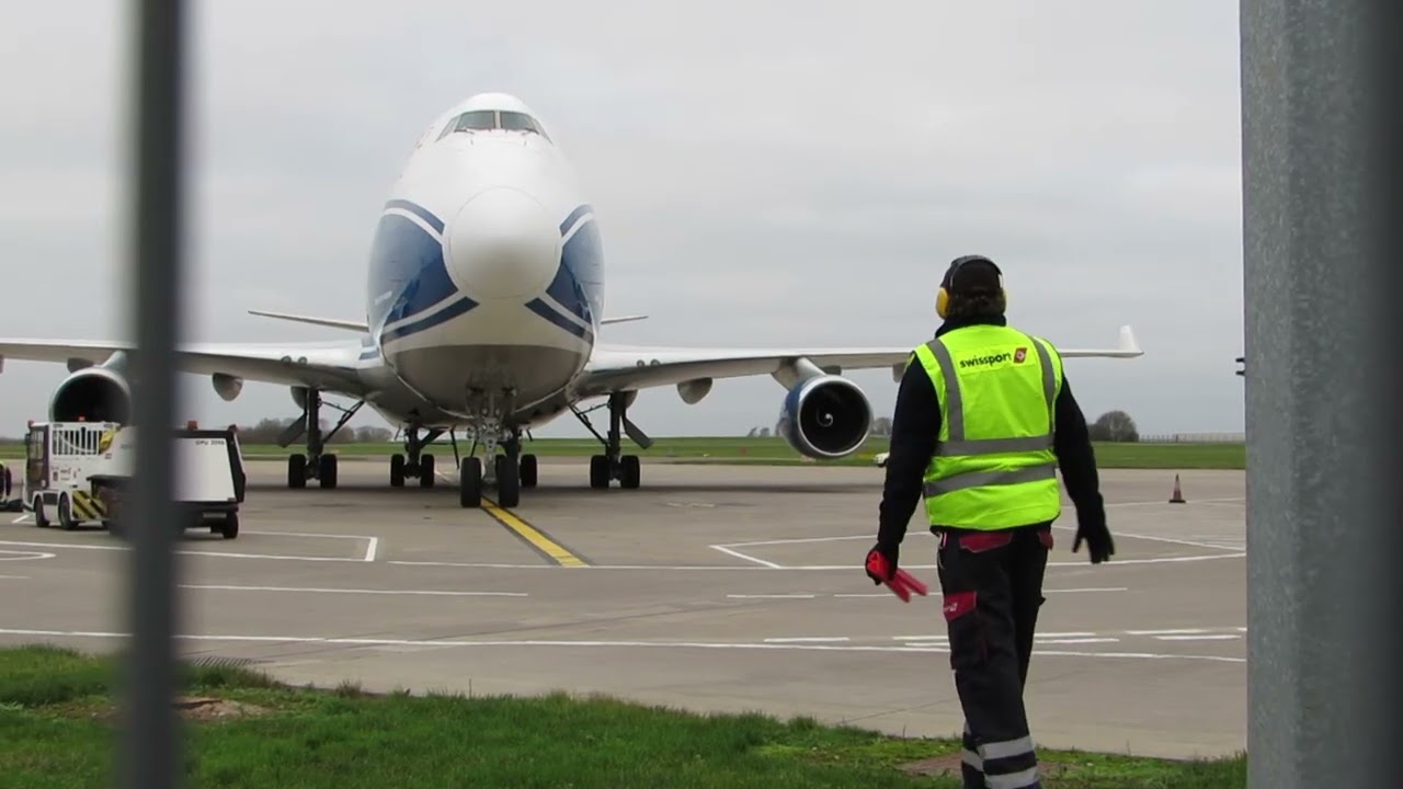 ONE AIR Boeing 747-400ERF being taxing onto stand