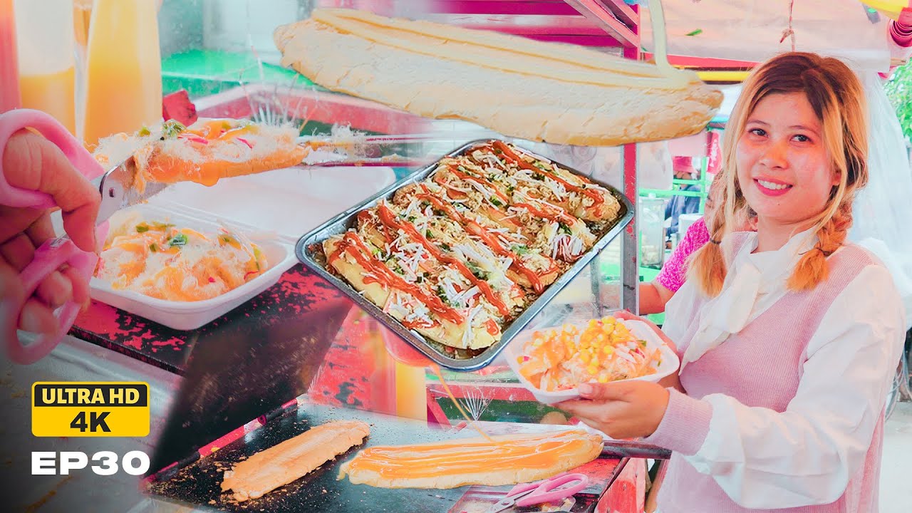 Freshly baked bread filled with fried meat, crab meatballs, garlic leaves, and sauce is a popular