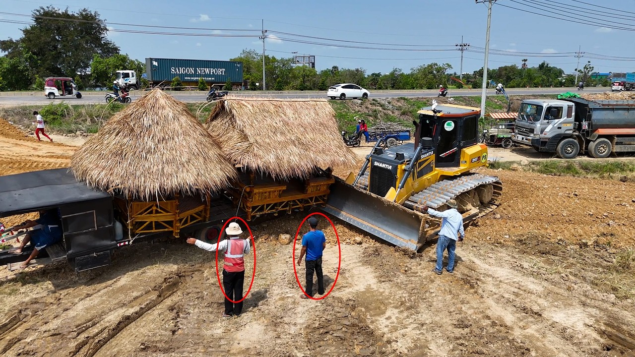 Bulldozer Starts New Project landfill with soil and 25 ton dump trucks 