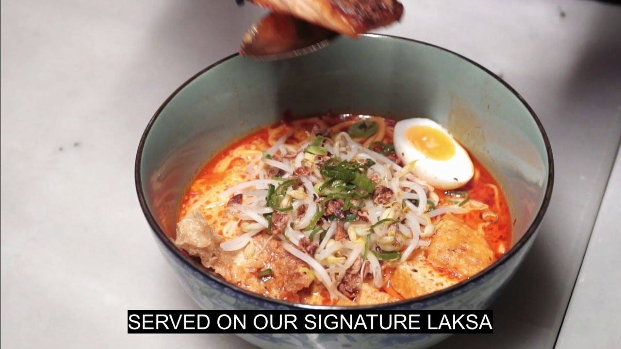 Crispy Skin Salmon Belly Laksa at Ho Jiak Haymarket