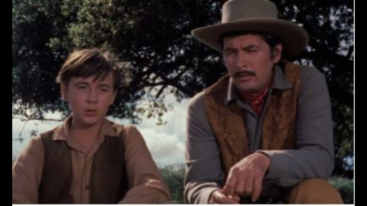 Travis's father Jim Coates returns home after Old Yeller has died