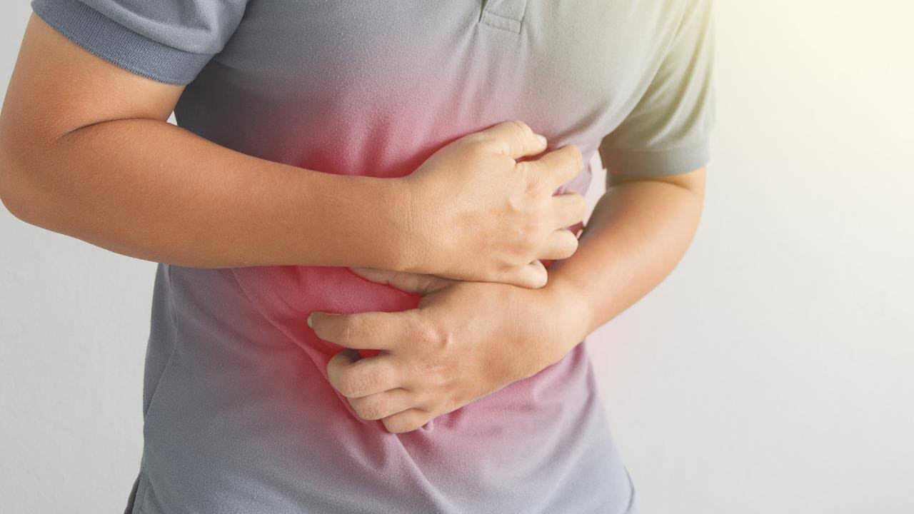 What Causes Stomach Ulcers + Is Stress Ever To Blame? A Doctor Answers