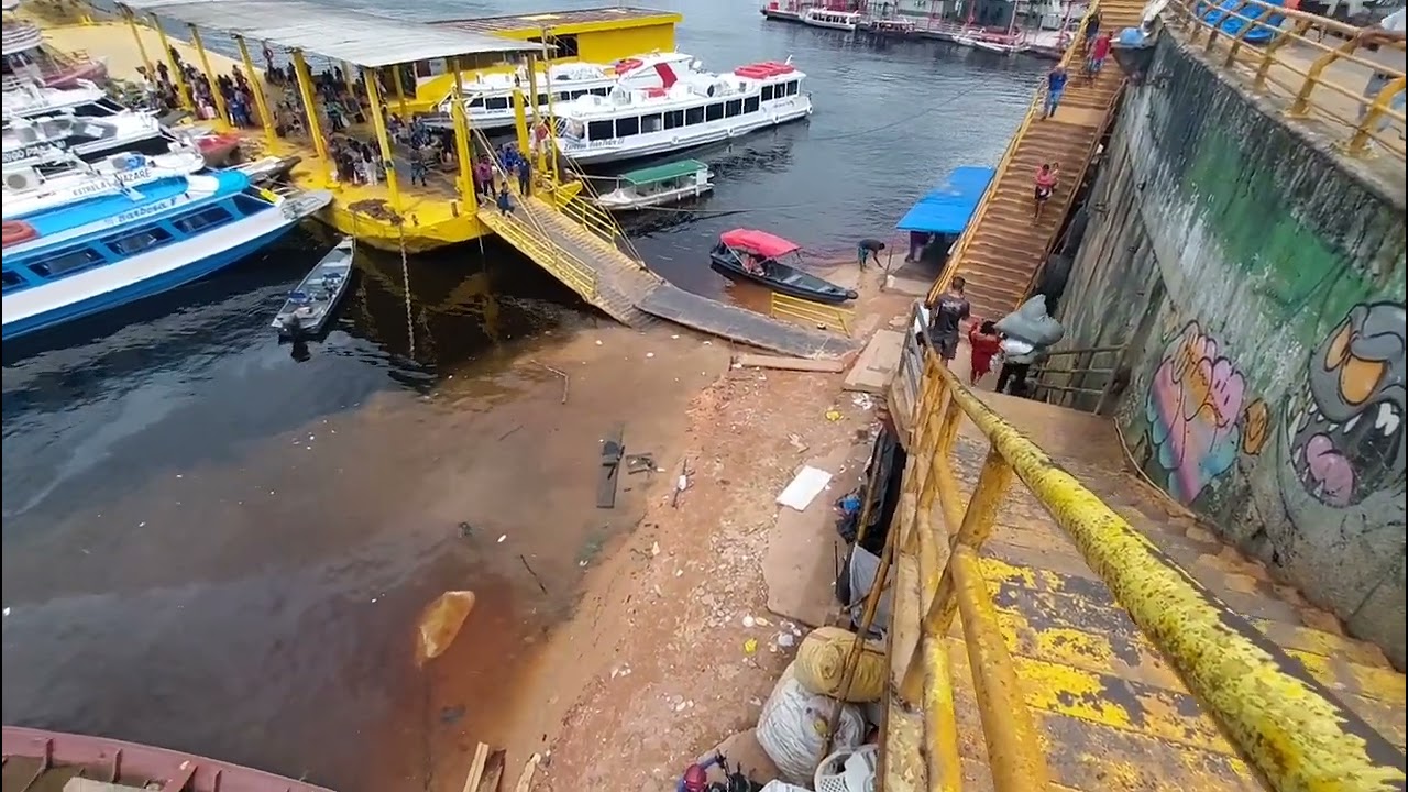 RIO NEGRO ENCHENDO E A MOVIMENTAÇÃO NO PORTO DE MANAUS