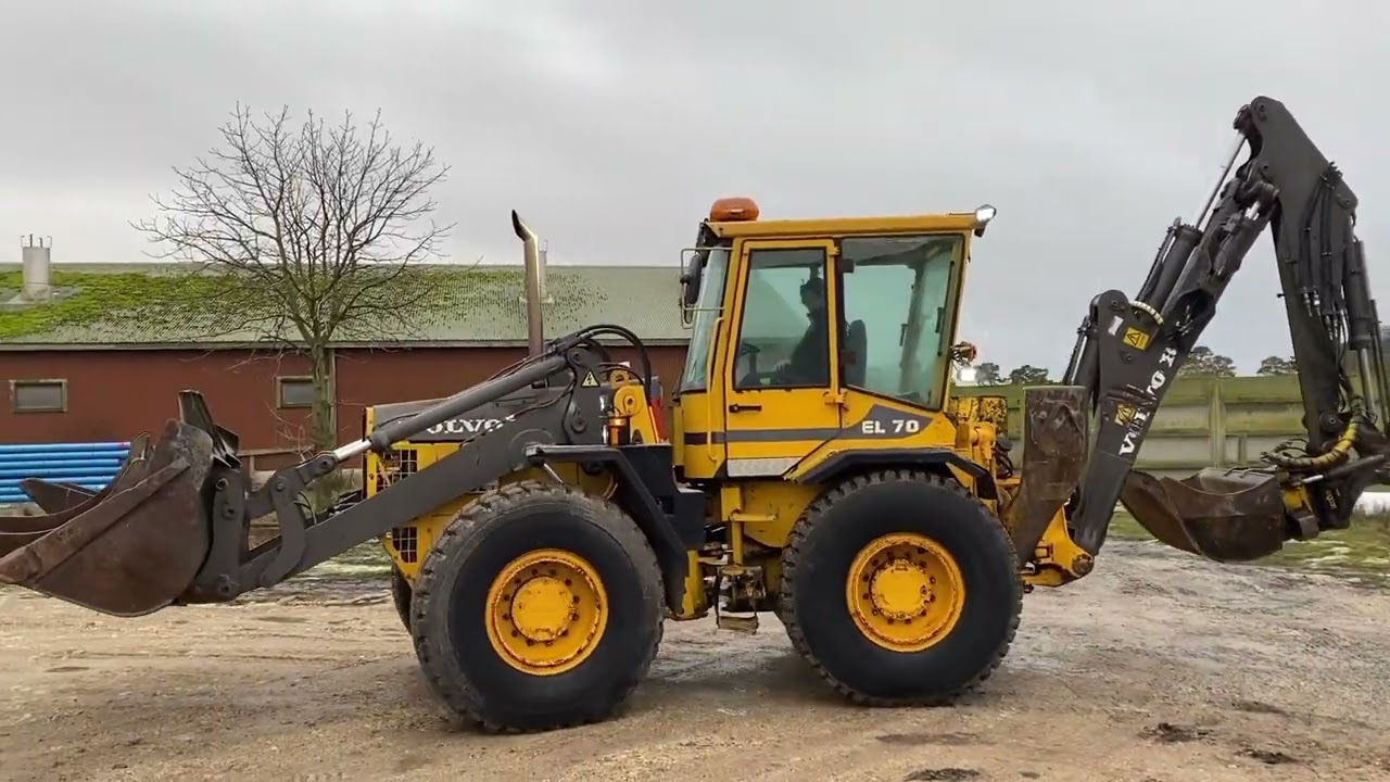 Köp Grävlastare Volvo BM EL70 med tiltrotator och skopor på Klaravik