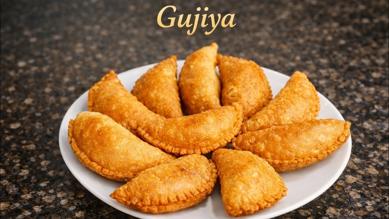 The Perfect Bite: Gujiya Bliss: A bite of pure tradition... 