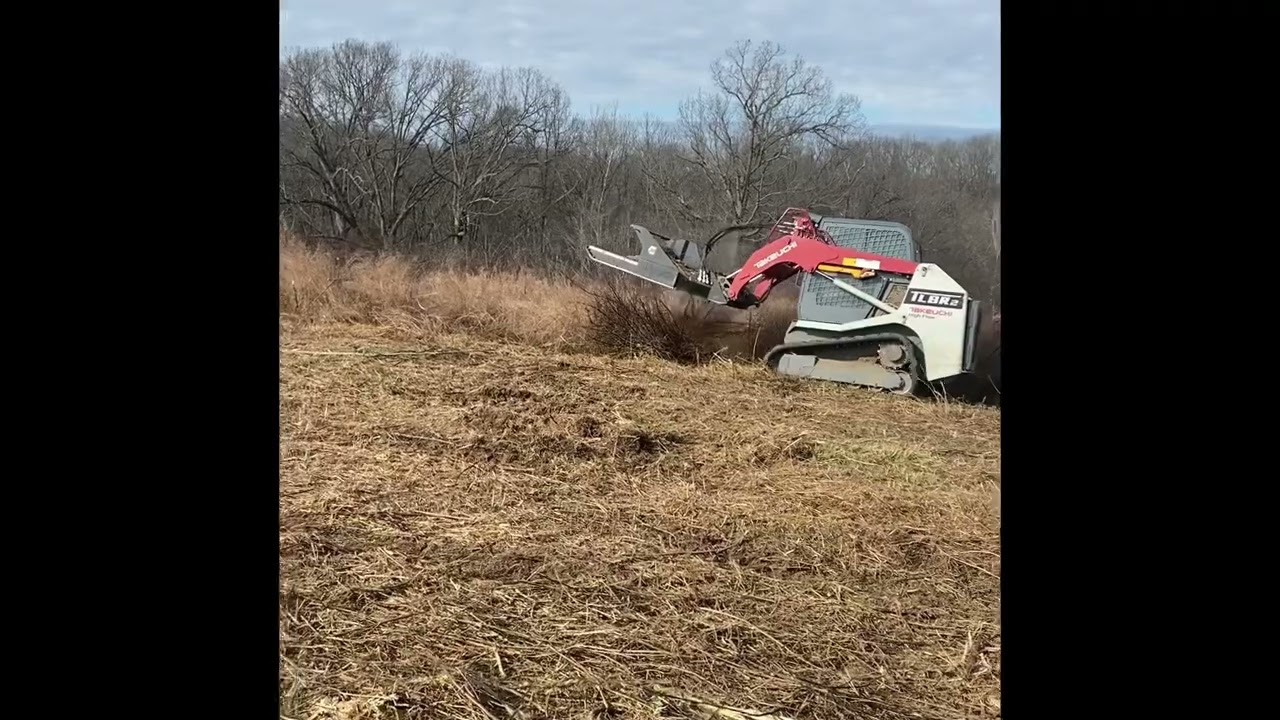 Takeuchi tl8r2 and vail x series brush mower