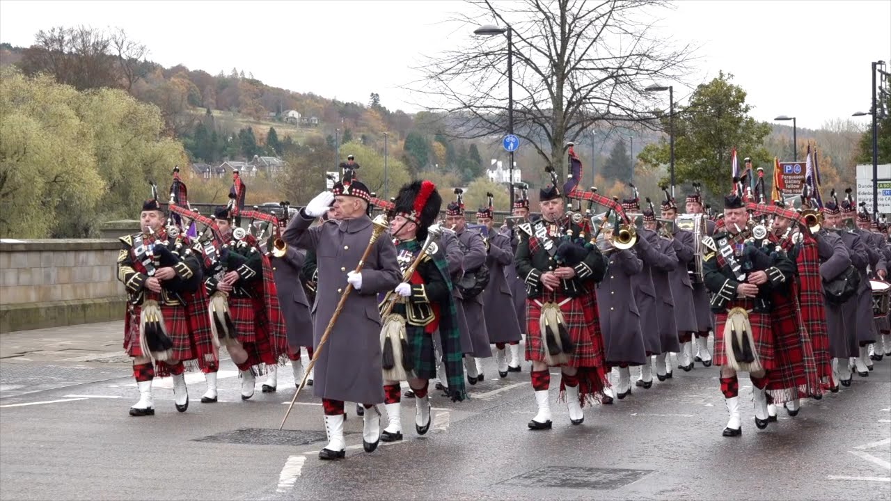 Remembrance Day Military Parade through City of Perth in Scotland led by 7 SCOTS Pipes and Drums