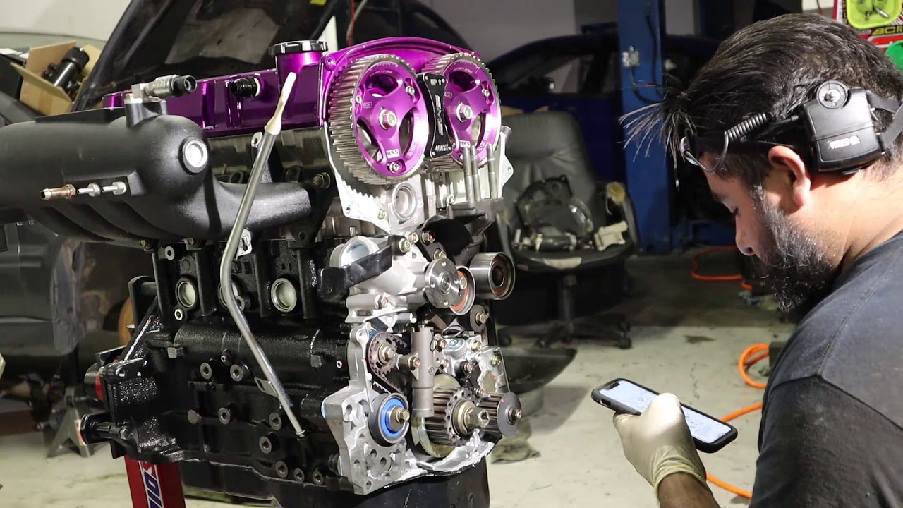 PART 2! BUILDING A 9 SECOND STOCKBLOCK EVO VIII! EVO GETS ENGINE AND TRANS ASSEMBLED