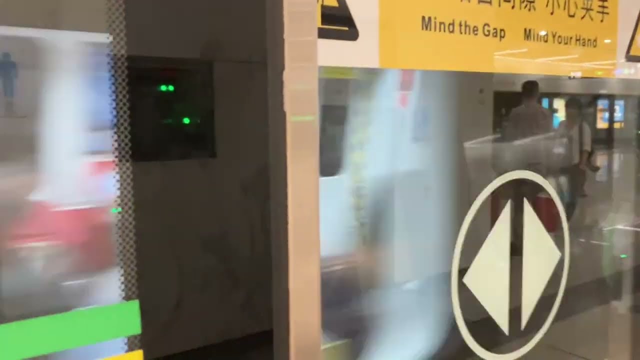 Shenzhen metro line 14 train Leaving Buji station