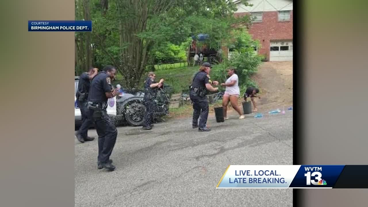 Routine call turns into water fight as Birmingham police officers bond with neighborhood children