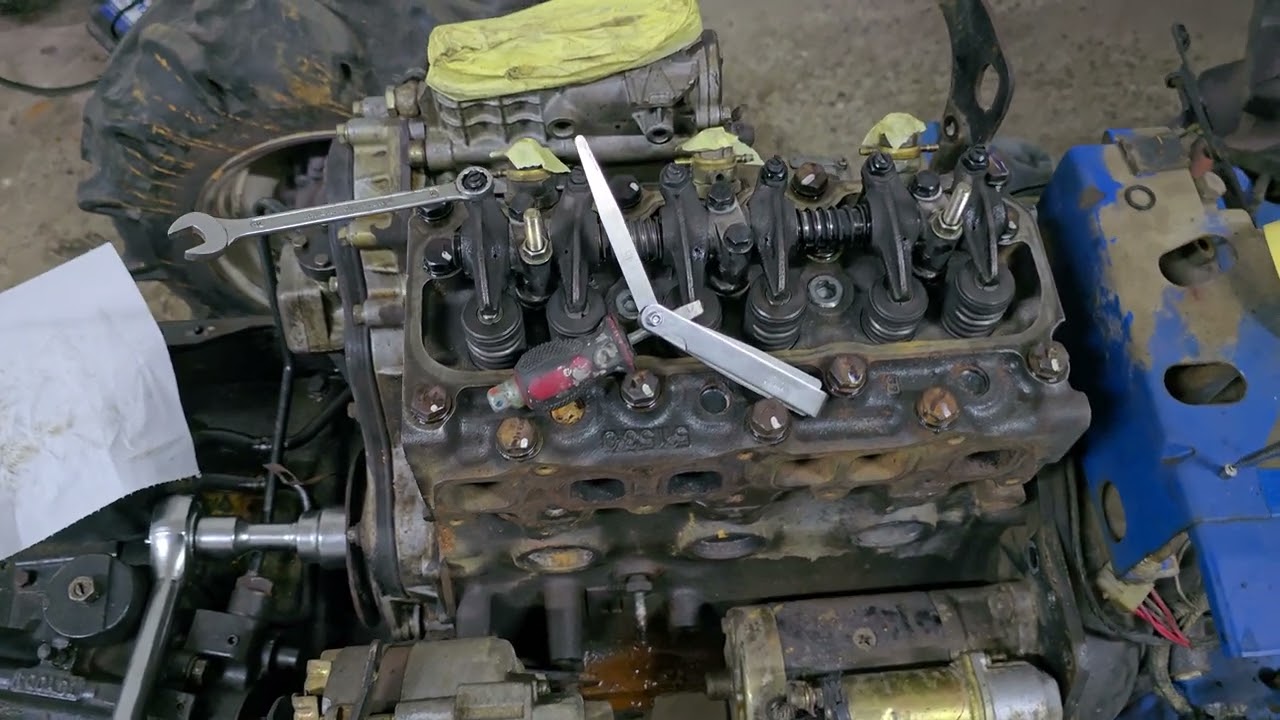 Jak regulować / ustawiać luzy zaworowe Iseki (isuzu 3af1)