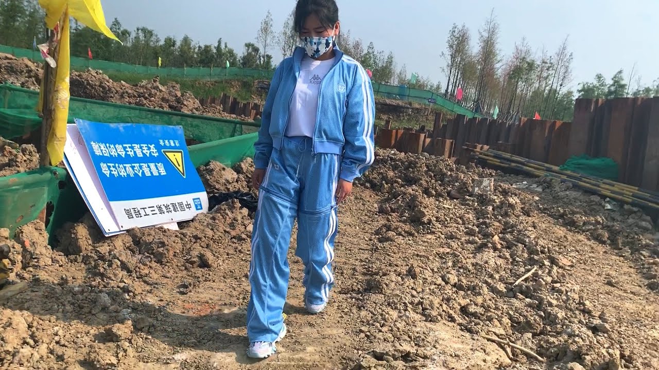 Cute Asian tracksuit girl struggles in deep mud | Muddy Girl | WAM