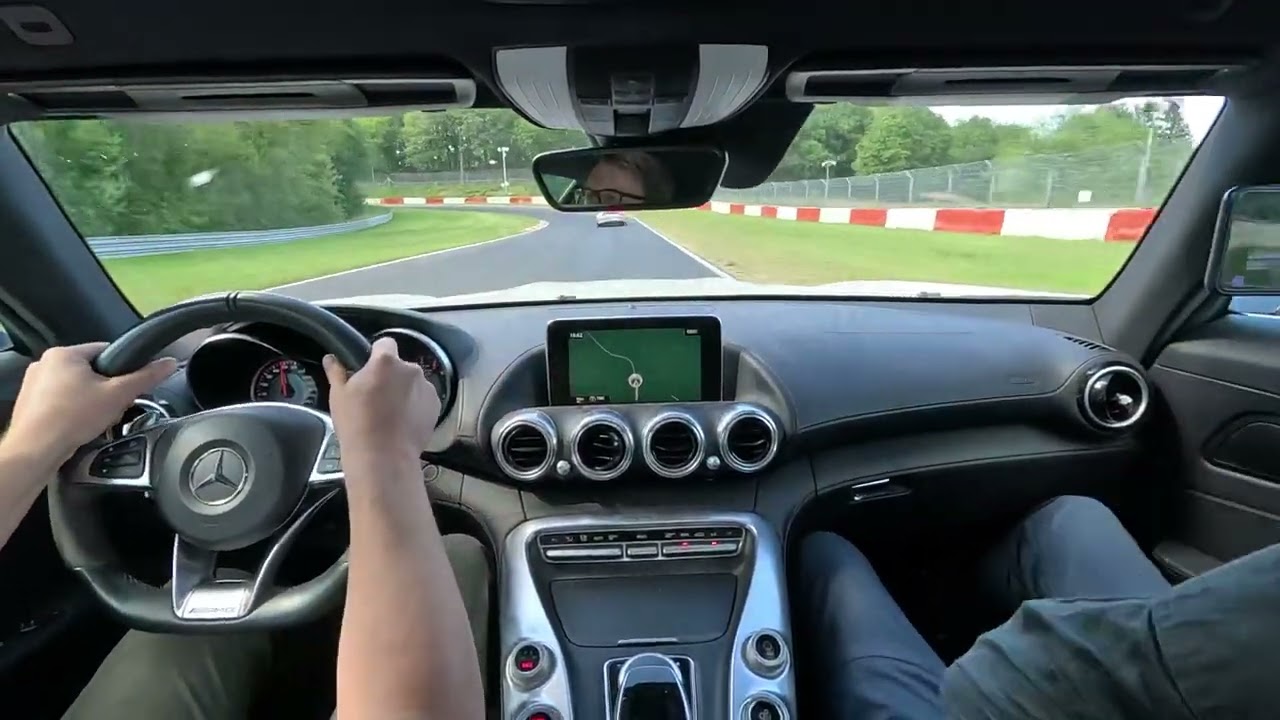 Mercedes amg gts chasing porsche 911 gt3 on the Nurburgring