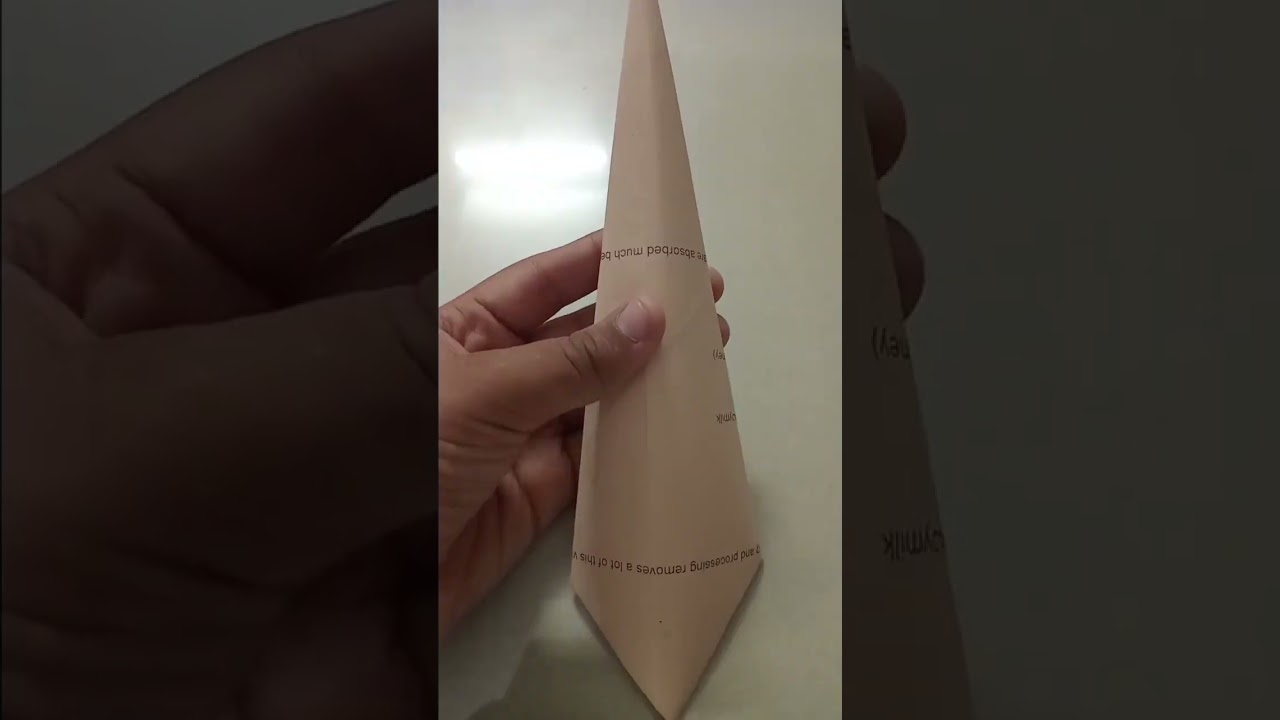Spear with paper 