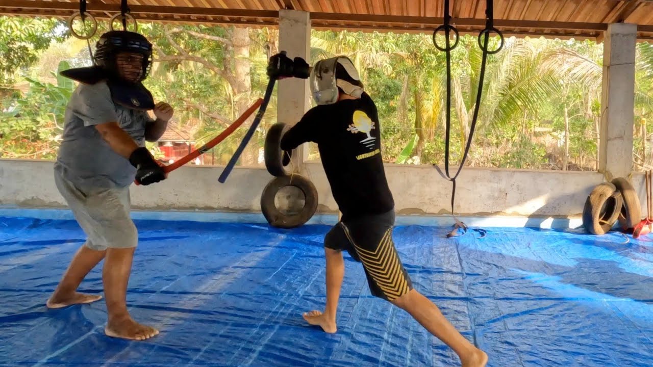 Mastering the Payong : The Artful Umbrella Technique of the Filipino Martial Arts