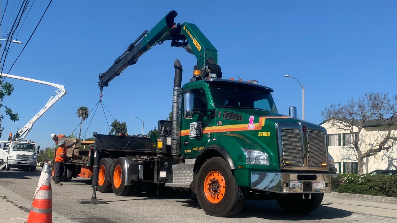 Trench shoring company SL805 dropping off some construction materials