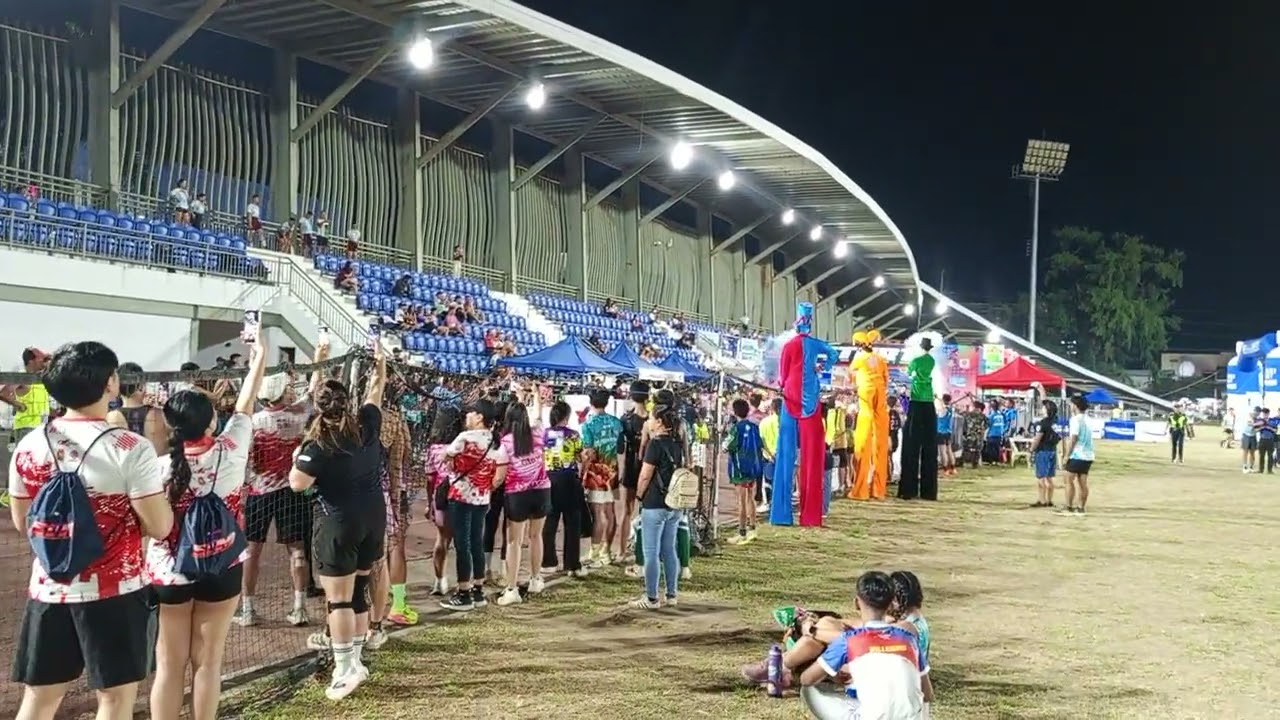 Run with heart and purpose, stilts walkers 