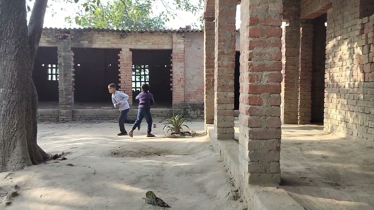 Cricket playing By School children 