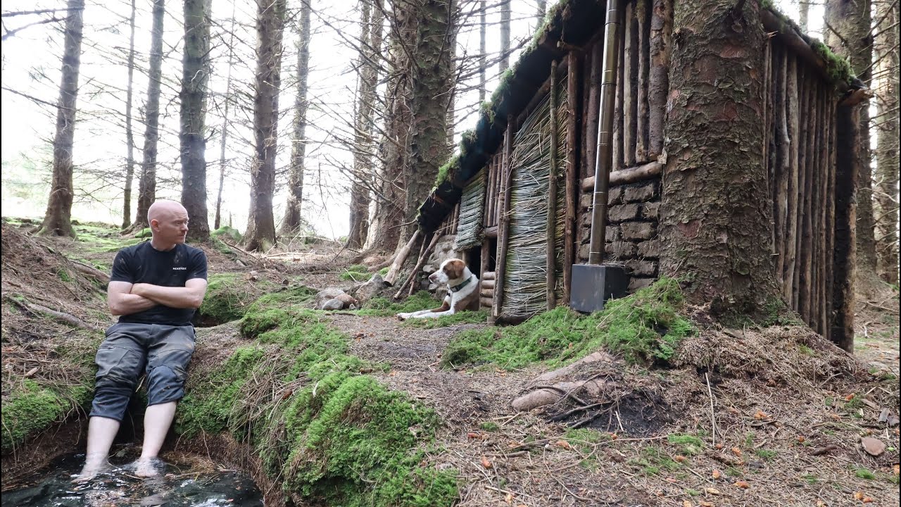 Building a beautfiul shelter in the woods ,warm wood stove inside