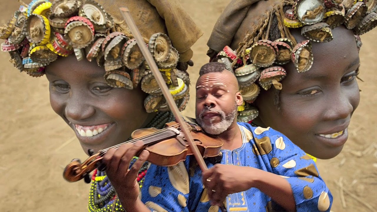 Izabella's wooden Heart Phoenix Rising Black History Month a cultural experience of Music & Art 2021