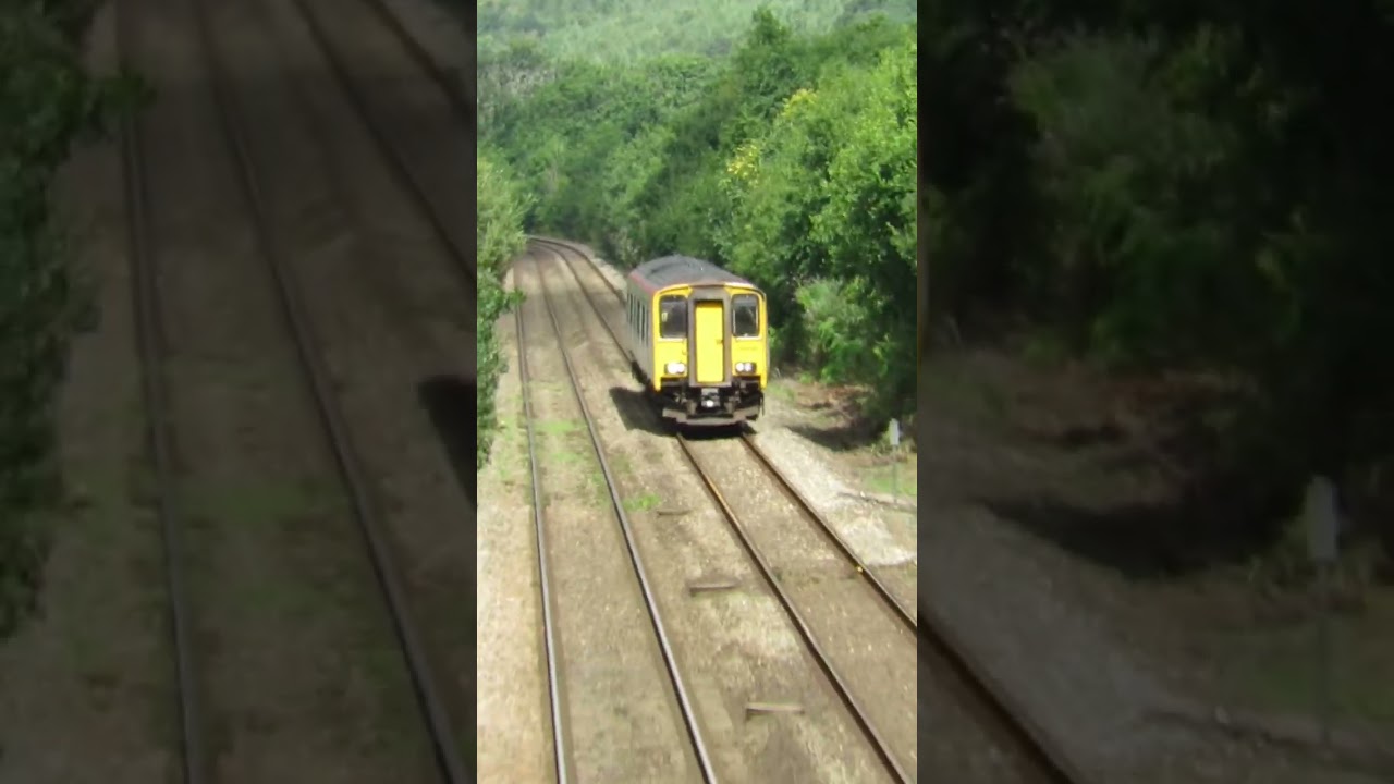 150208 passes Llantrisant West LC on arrival into Pontyclun