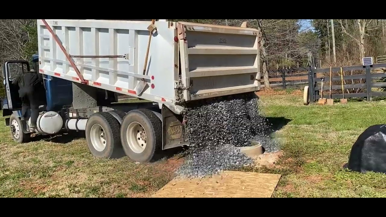 Filling our old 30&rdquo; wide X 60&rsquo; deep well with a load of gravel. Save Timmy!!!