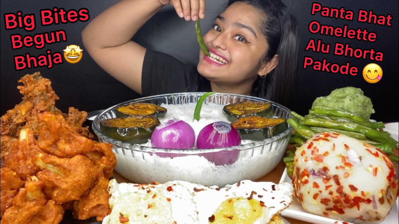 PANTA BHAT/POKHAL BHAAT, SUNNY SIDE UP EGGS, GOBI PAKODA, ONION PAKODA,ALU BHORTA,BEGUN BHAJA,CHILLI