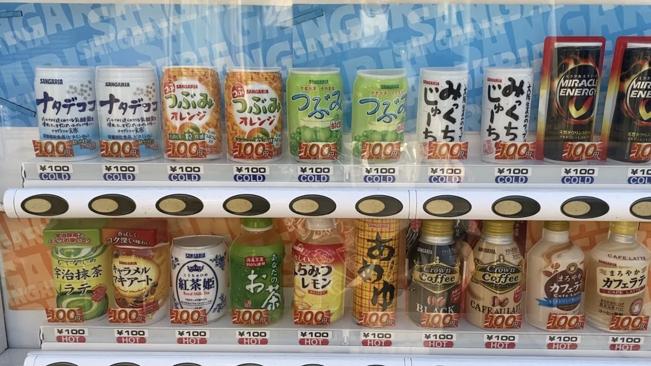 3 консервированных сока продаются в японском торговом автомате