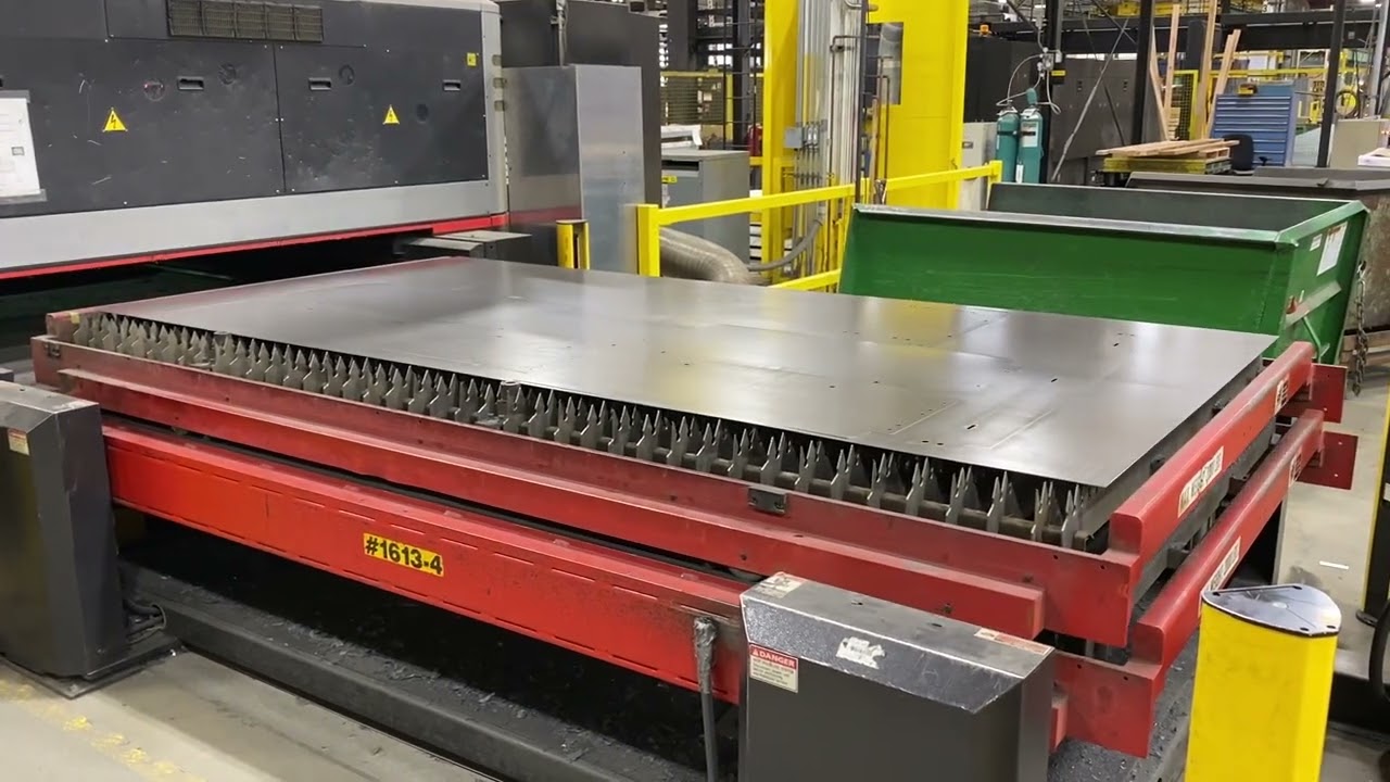 Amada FOL-3015AJ fiber laser,  shuttle tables