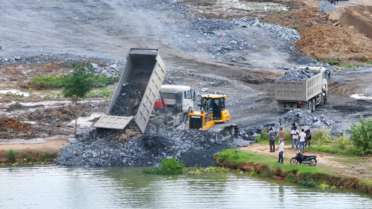 Fantastic Project Skills Operator Push Rock Filling In Water Building Road BY SHANTUI Dozer