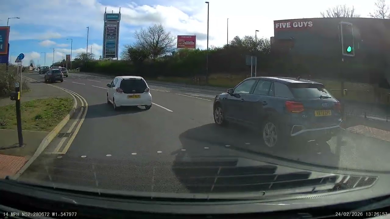 Audi Q2 cuts up cammer and the waves a rude gesture!