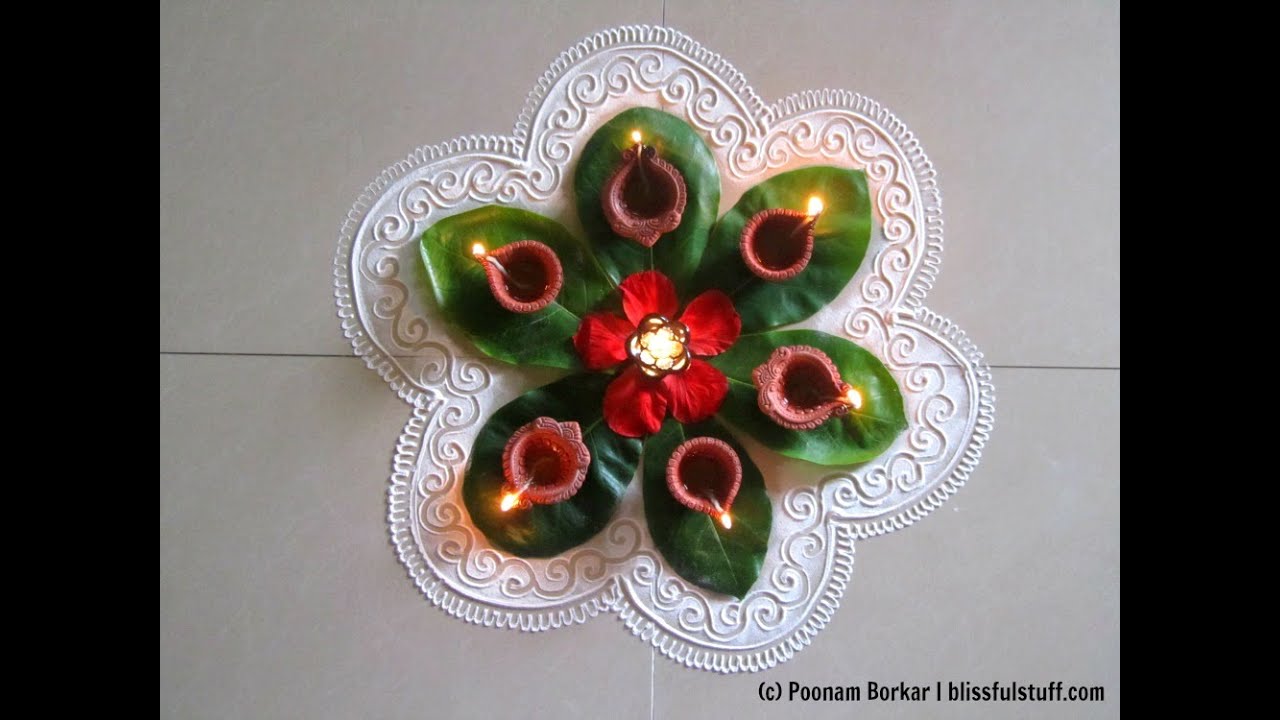 Easy and beautiful rangoli using almond leaves | Innovative rangoli designs by Poonam Borkar