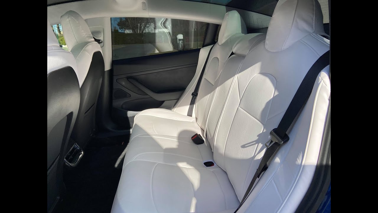 Tesla model 3 SR+ pose de housses blanches et vérification des caches étriers rouges après 12000 kms