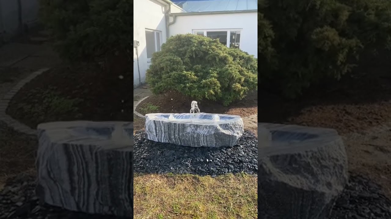 Springbrunnen Wachauer Marmor Quellstein Findling