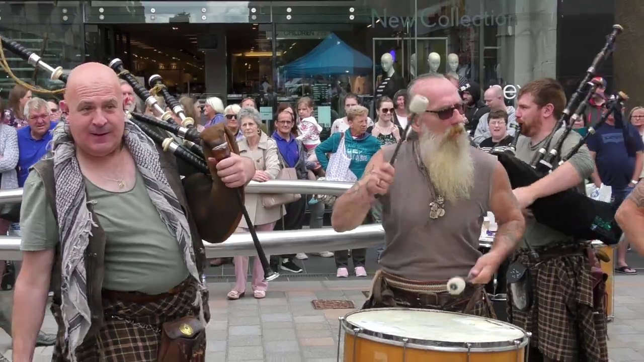 Wild men of Scottish street music Clanadonia playing 