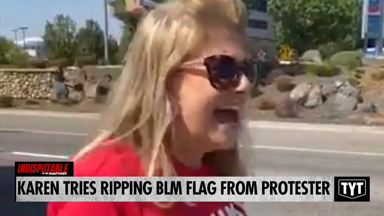 Karen Tries RIPPING BLM Flag From Protester
