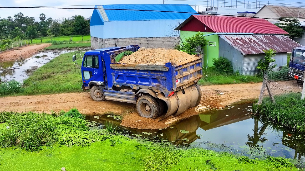 Heavy Equipment at Work: KOMATSU D20P Dozer & 5Ton Dump Truck Starting New Project landfill