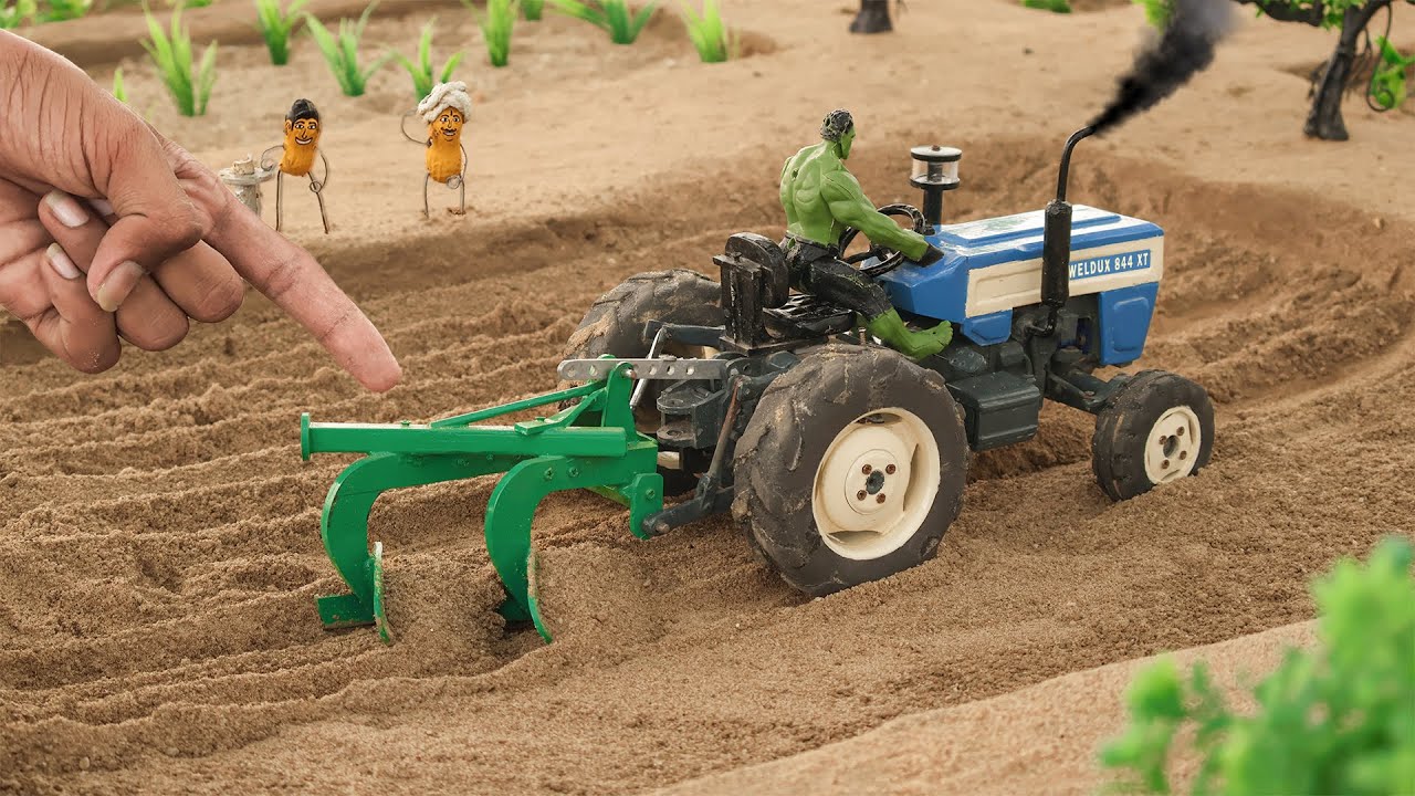 diy mini tractor and small plough in field farming science project @Weldux ​