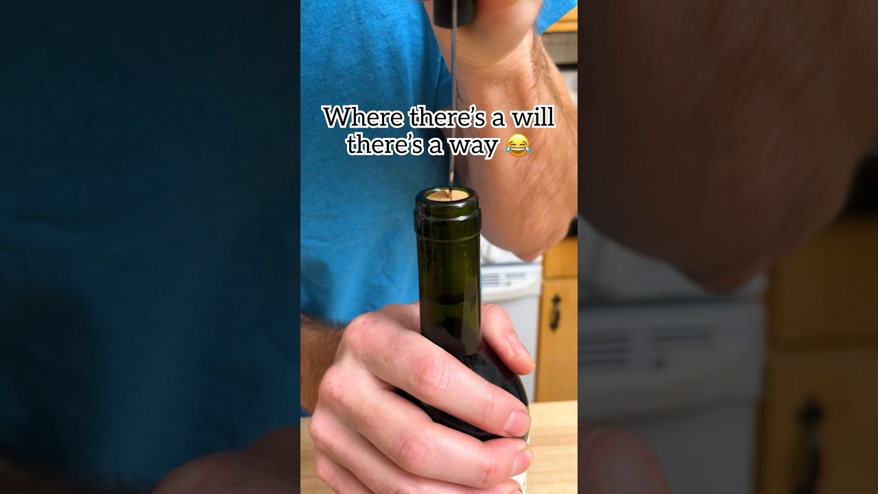 When there's no cork screw use a knife with a fork to open a wine bottle!