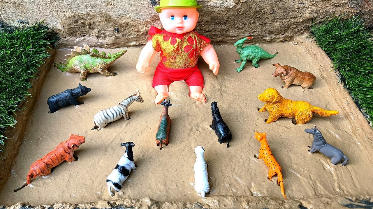 Cleaning toy animal cheetah, hippo, horsh, tiger, panda, dinosaur, dog, buffalo, zebra, cow and baby