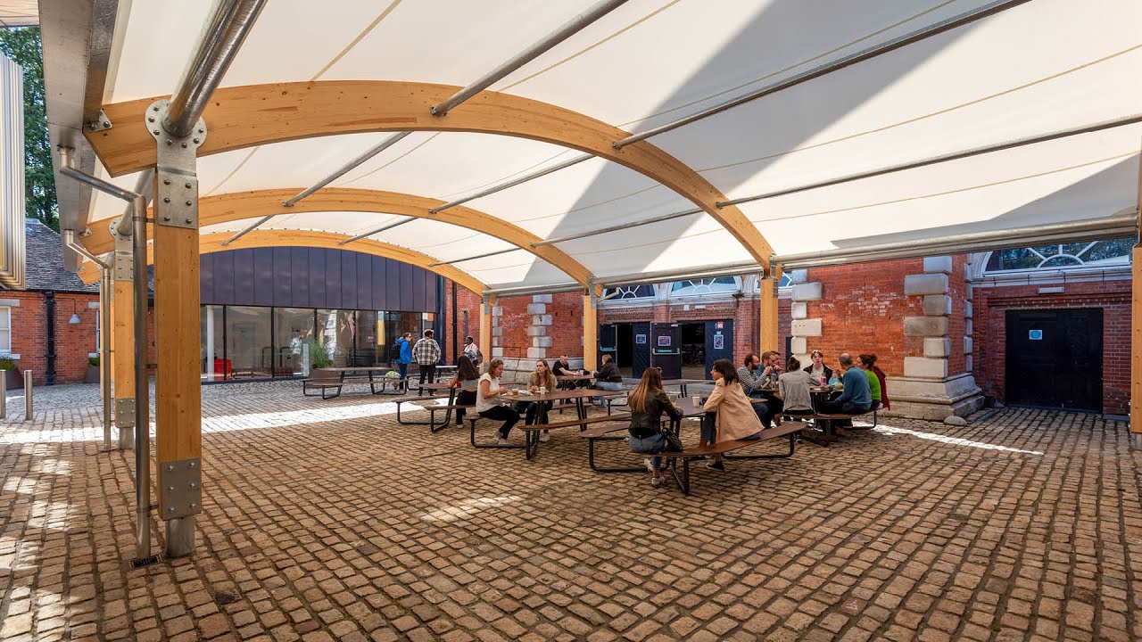 Royal Holloway, University of London selects Glulam dining canopy for heritage setting