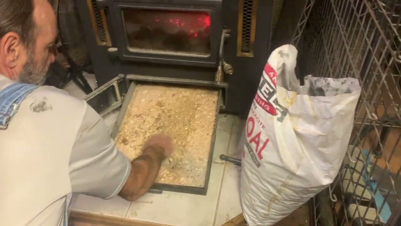 How to heat a Big House with Hand Fired Coal Stoves. Burning Coal made easy. Hitzer 503 EZ Insert.
