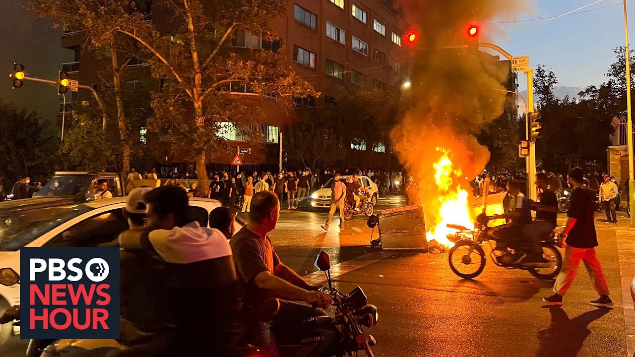 Protests erupt in Iran after death of woman arrested for violating dress code