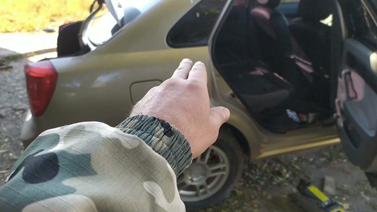 СТУК В ЗАДНЕЙ ЧАСТИ АВТО .