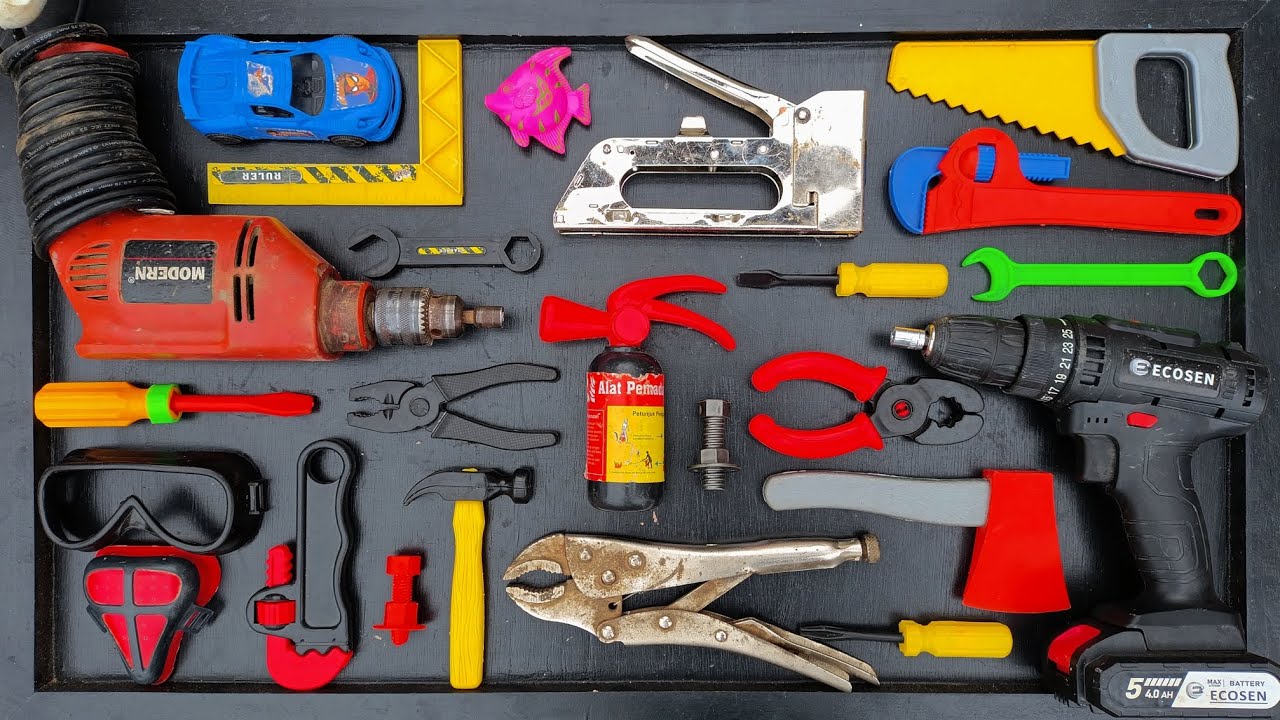 Collection of Repair Tools, Electric Drill, Electric Saw, Hammer With Wriench, Pliers, Hacksaw