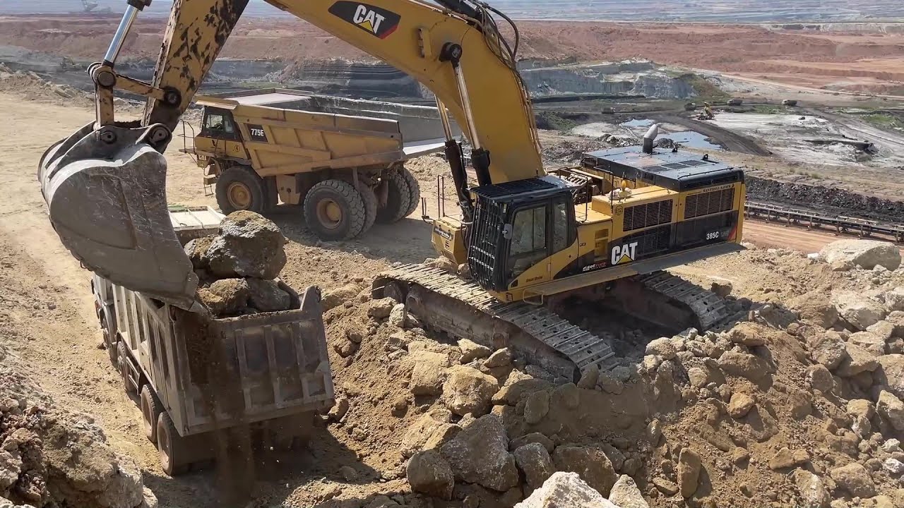 Caterpillar 385C Excavator Loading Caterpillar 775E Dumper And Trucks - Sotiriadis/Labrianidis Mines