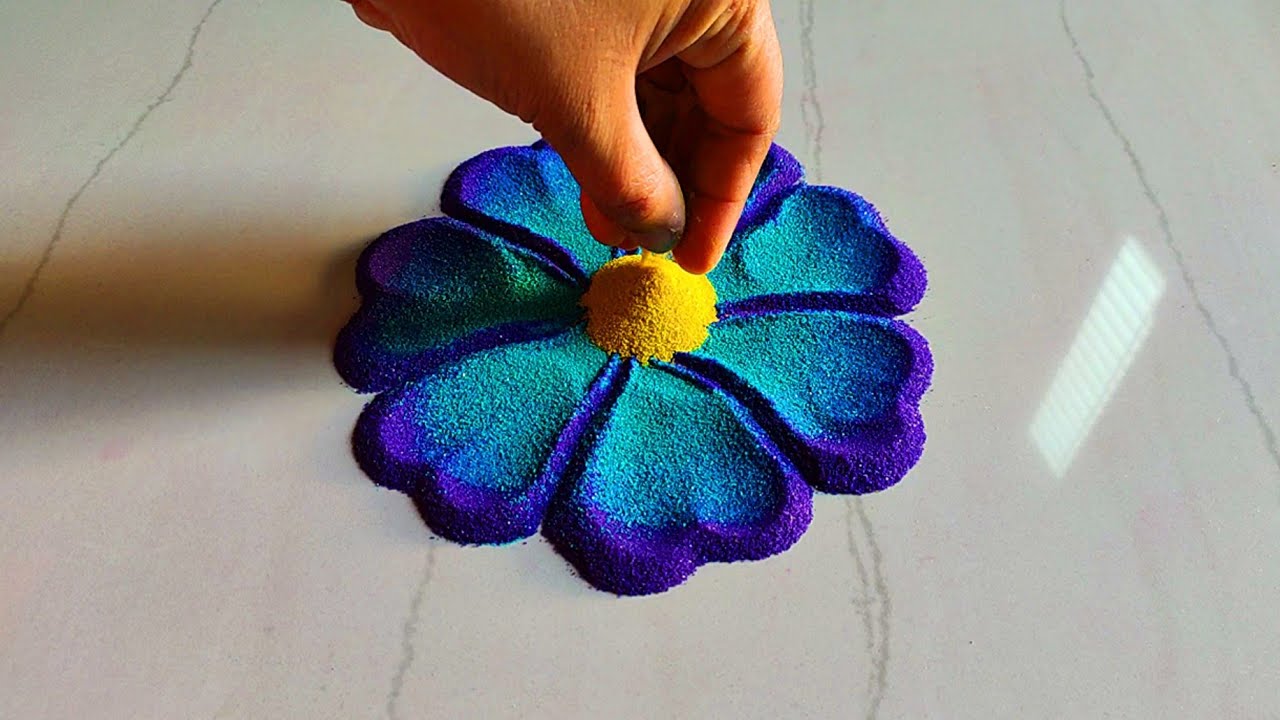 Beautiful and innovative flowers rangoli designs with colours
